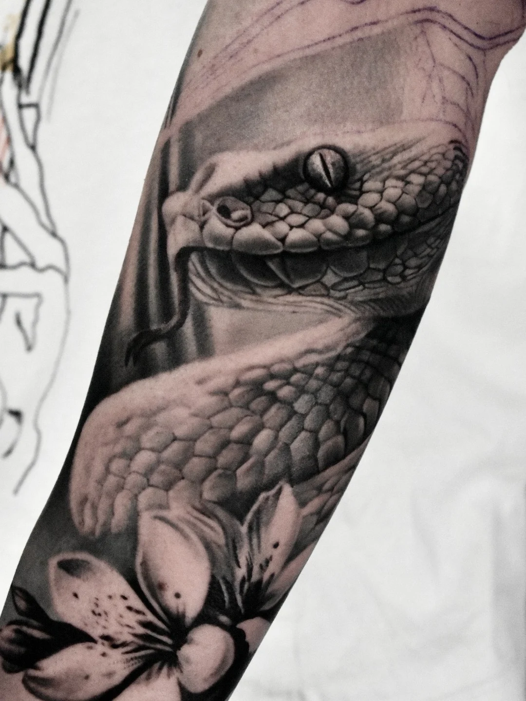 Realistic serpent tattoo